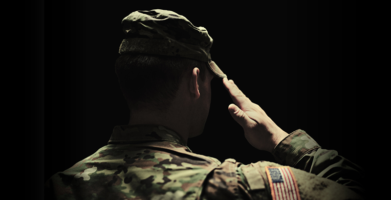 Service member reviewing gold and silver holdings
